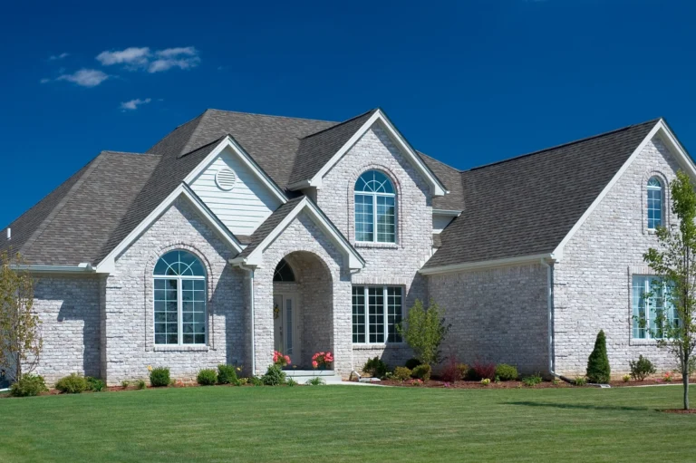 home shingle roof blue sky