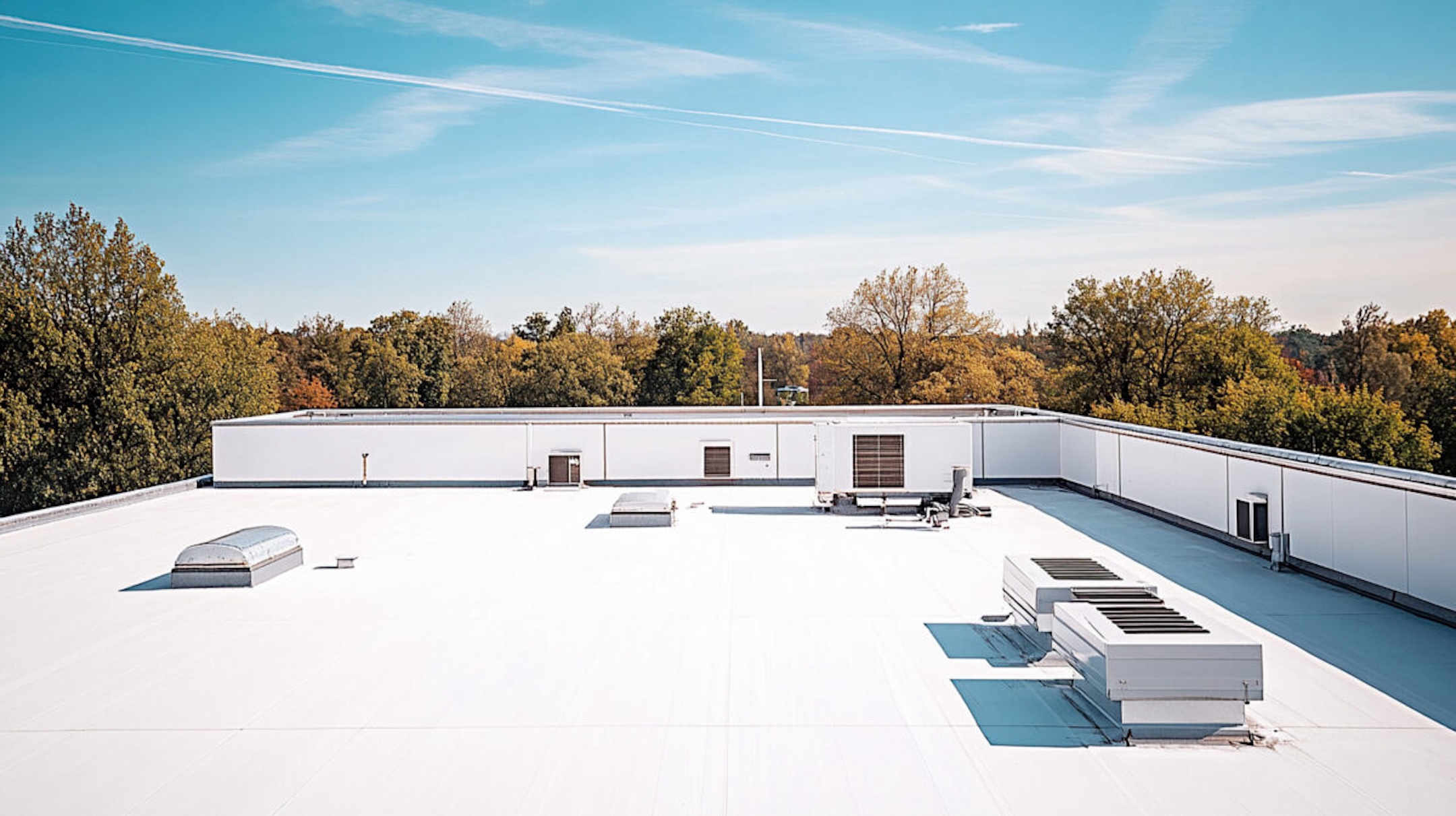 white flat roof with vents