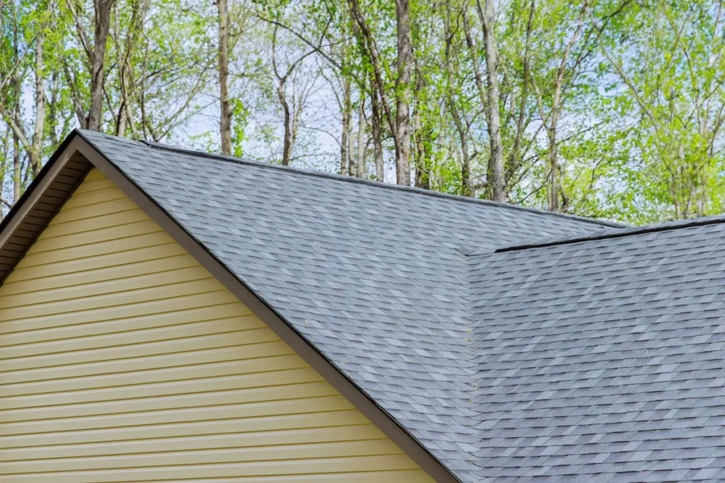 Newly built house roof top is covered with asphalt shingles