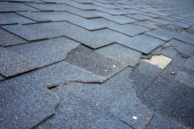 close-up damaged shingles