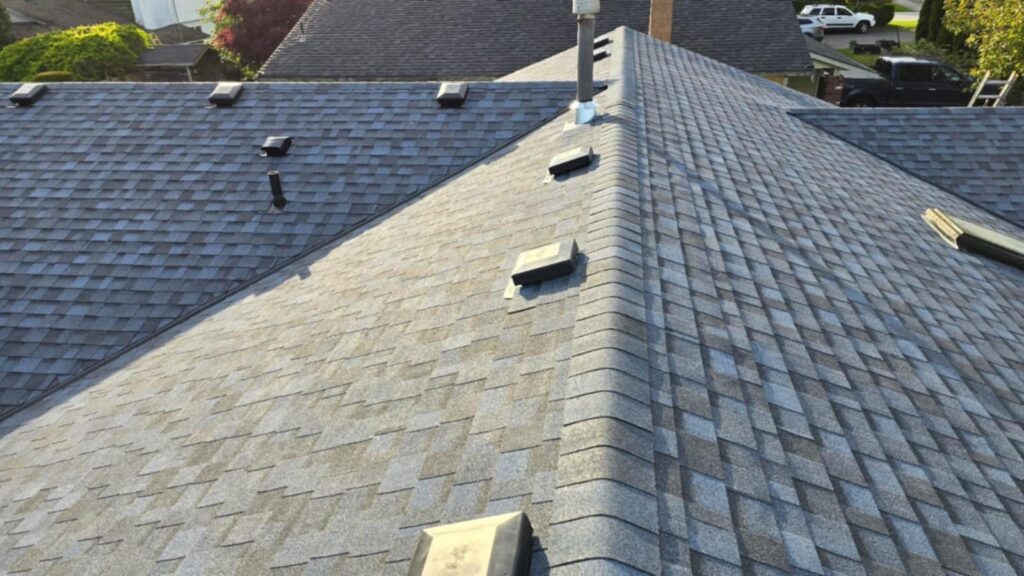 Sloped roof with grey shingles