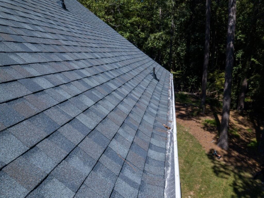 architectural shingles vs asphalt shingles close up grey roof