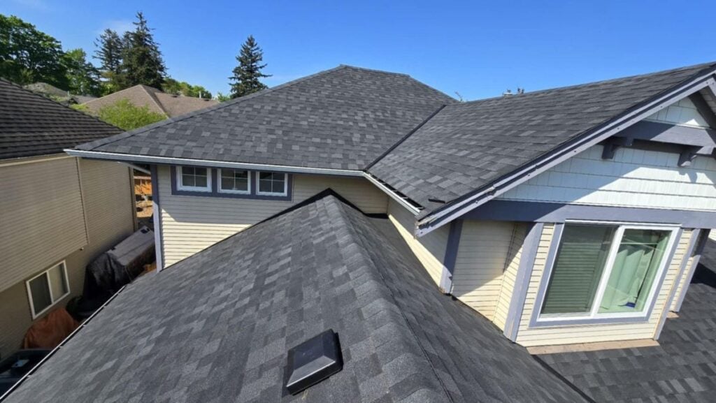 asphalt shingle roof replacement family american house light yellow siding