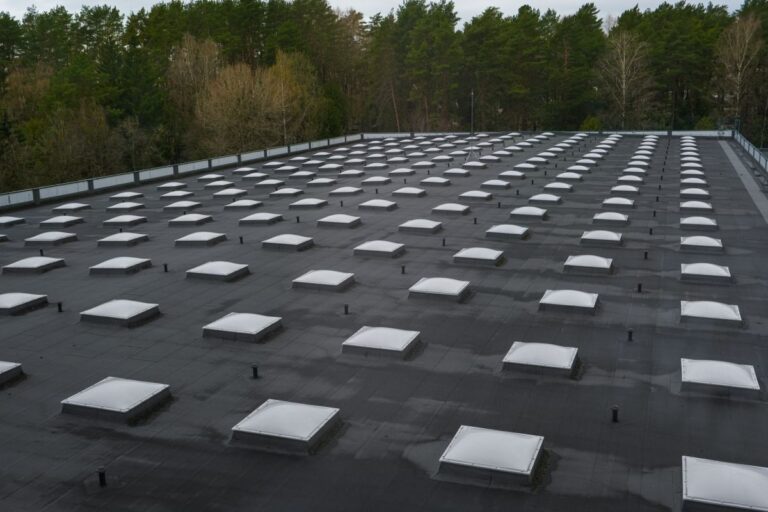 epdm rubber roofing multiple vents winter time