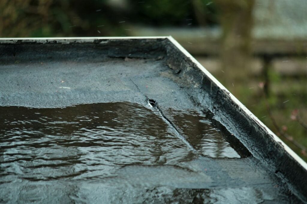 epdm rubber roofing water ponding on top of roof