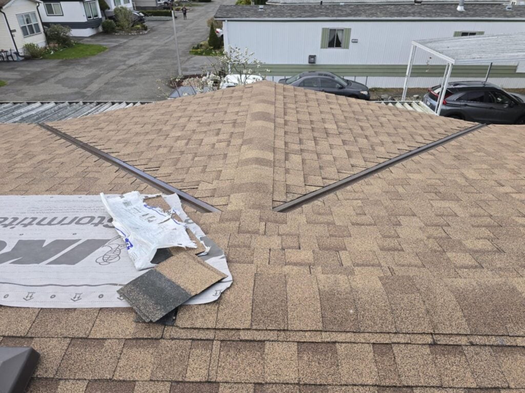 Roof material being installed