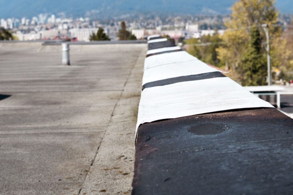 peel and stick waterproof membrane on flat roof edge